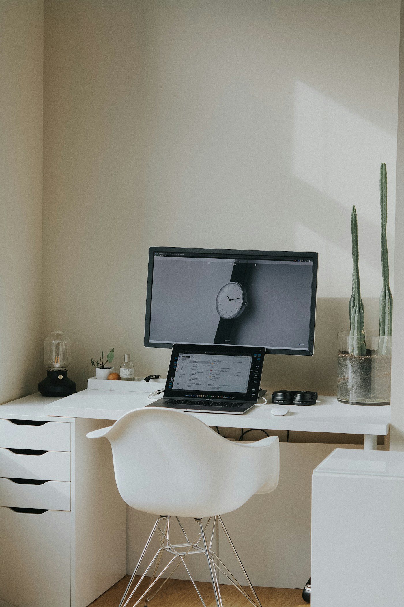 A laptop and desktop workspace
